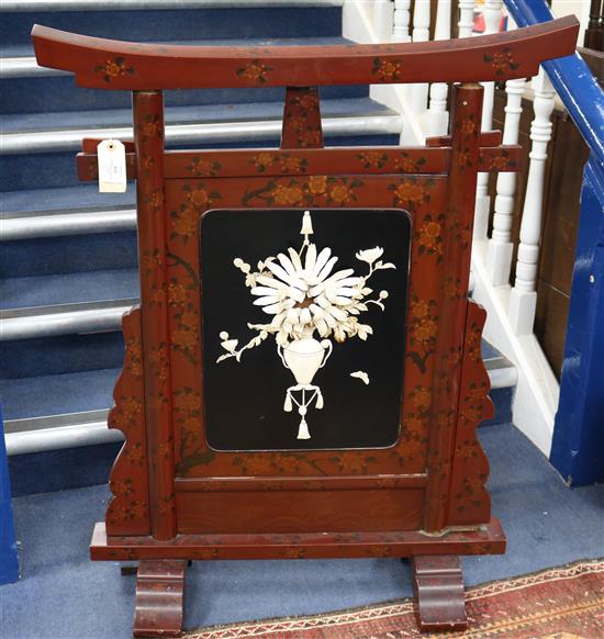 A Japanese Meiji period lacquer and carved bone screen, W.2ft 9in. H.3ft 5in.